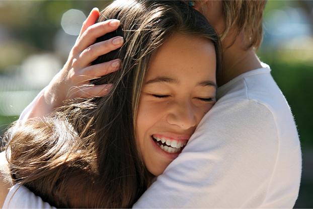 Youth held in arms